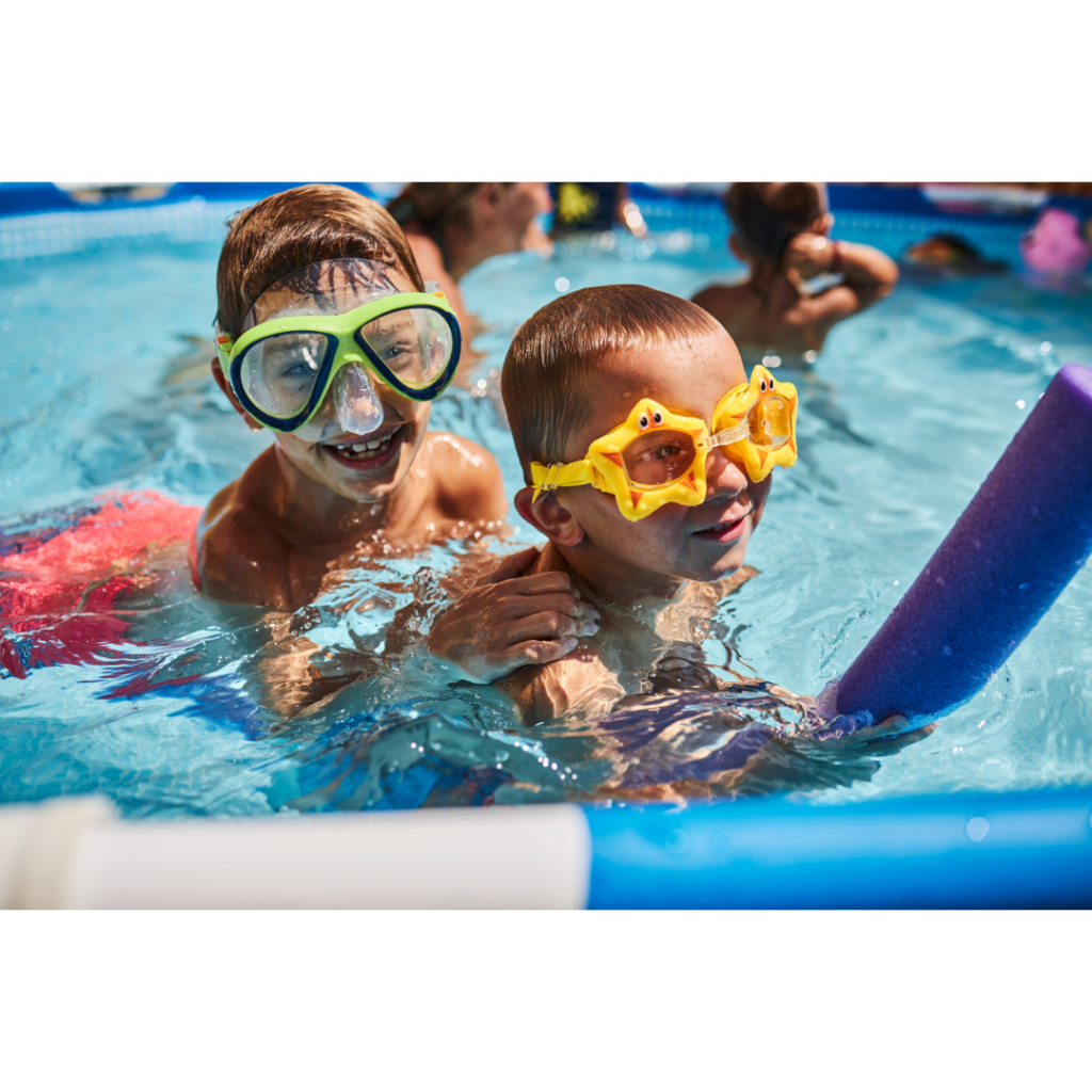 Young boys swimming in a pool